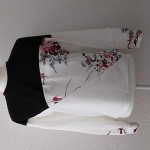 Stellar Design; Long Sleeve Asymmetric, Floral Top.
